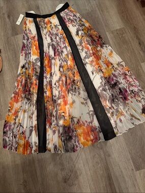 bebe Floral Pleated Maxi Skirt in White with Orange and Purple Accents